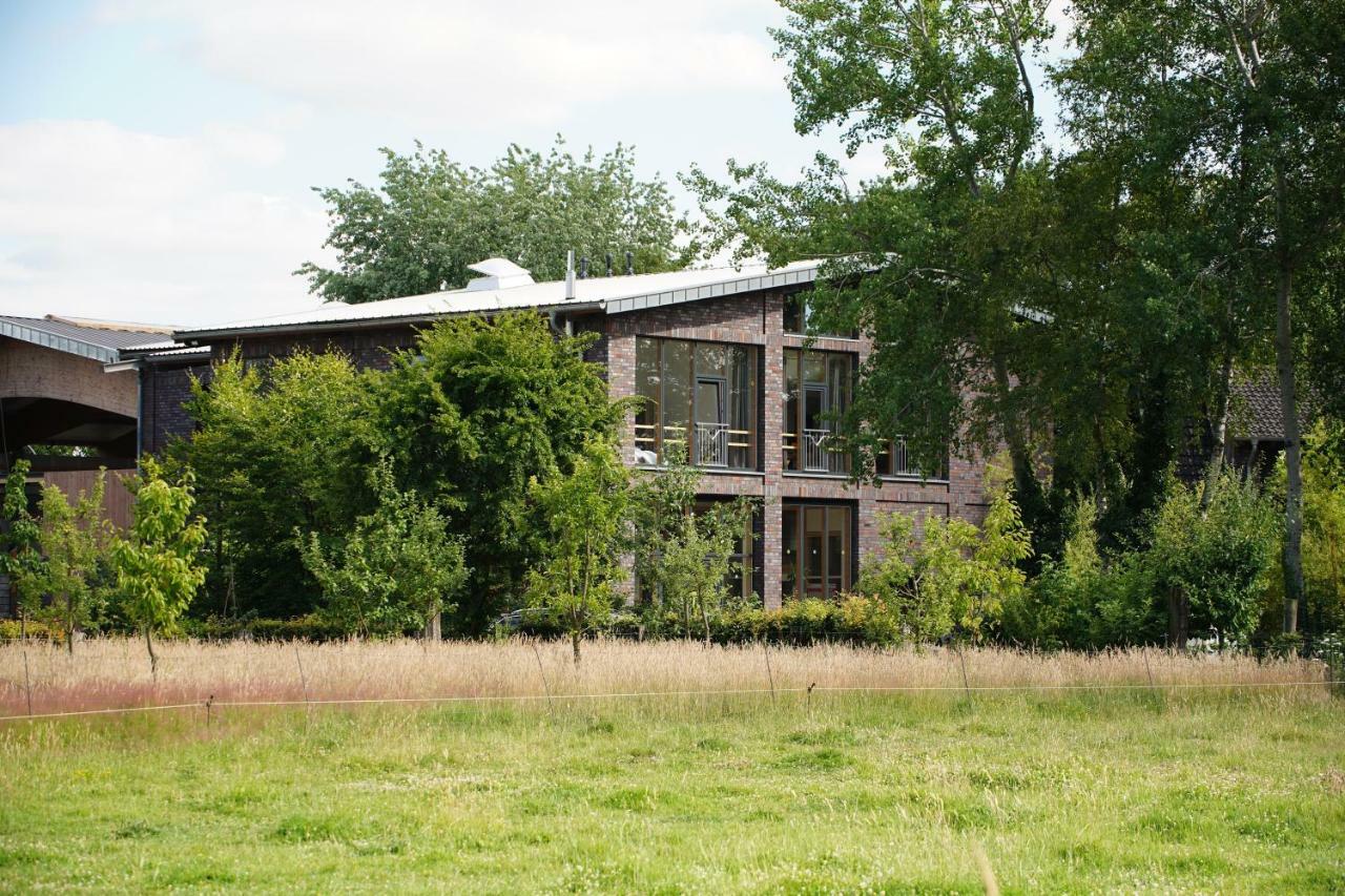 Gaestewohnung Hardinghaus Am Teich 瓦伦多夫 外观 照片